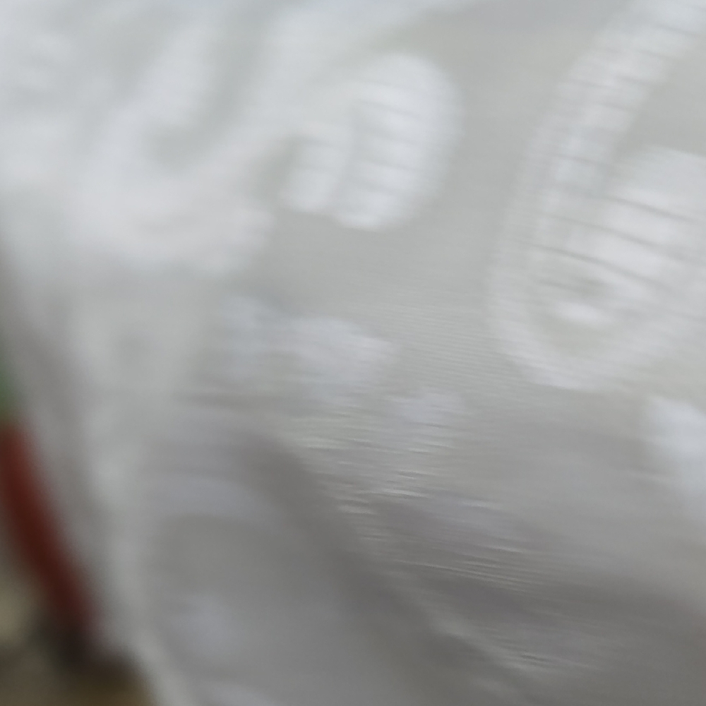 White Paisley Patterned Fabric